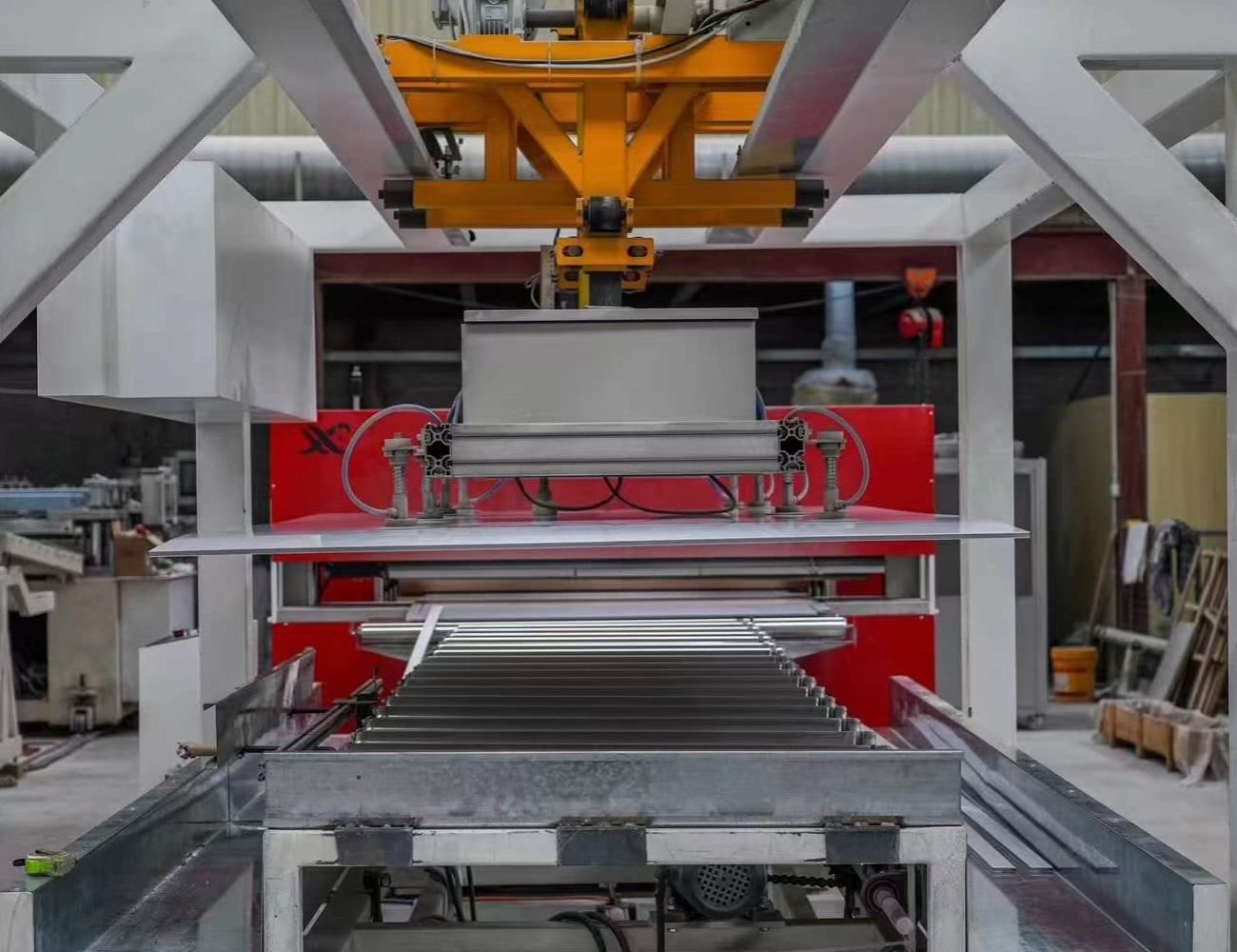 Automated WPC wall panel extrusion production line in modern manufacturing facility