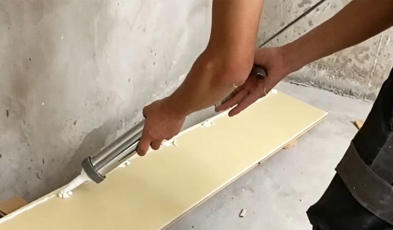 Apply construction adhesive on the back of Bamboo Wood Fiber Wall Panel