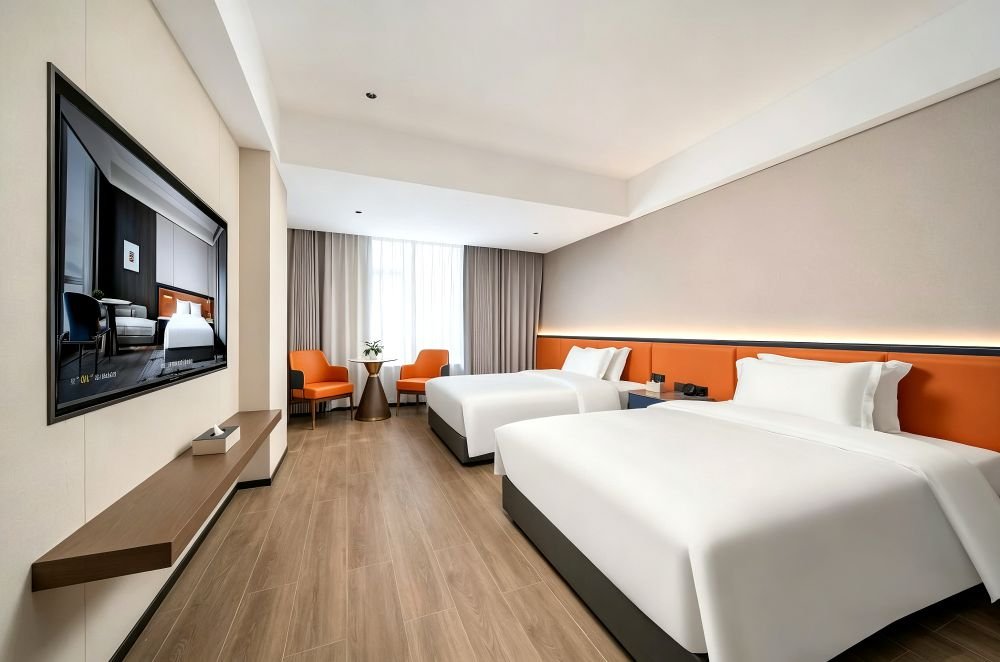 A 10,000 m² Hotel Project with a Unified WPC Anti-Collision Wall System 3 Guest room interior in a chain hotel project